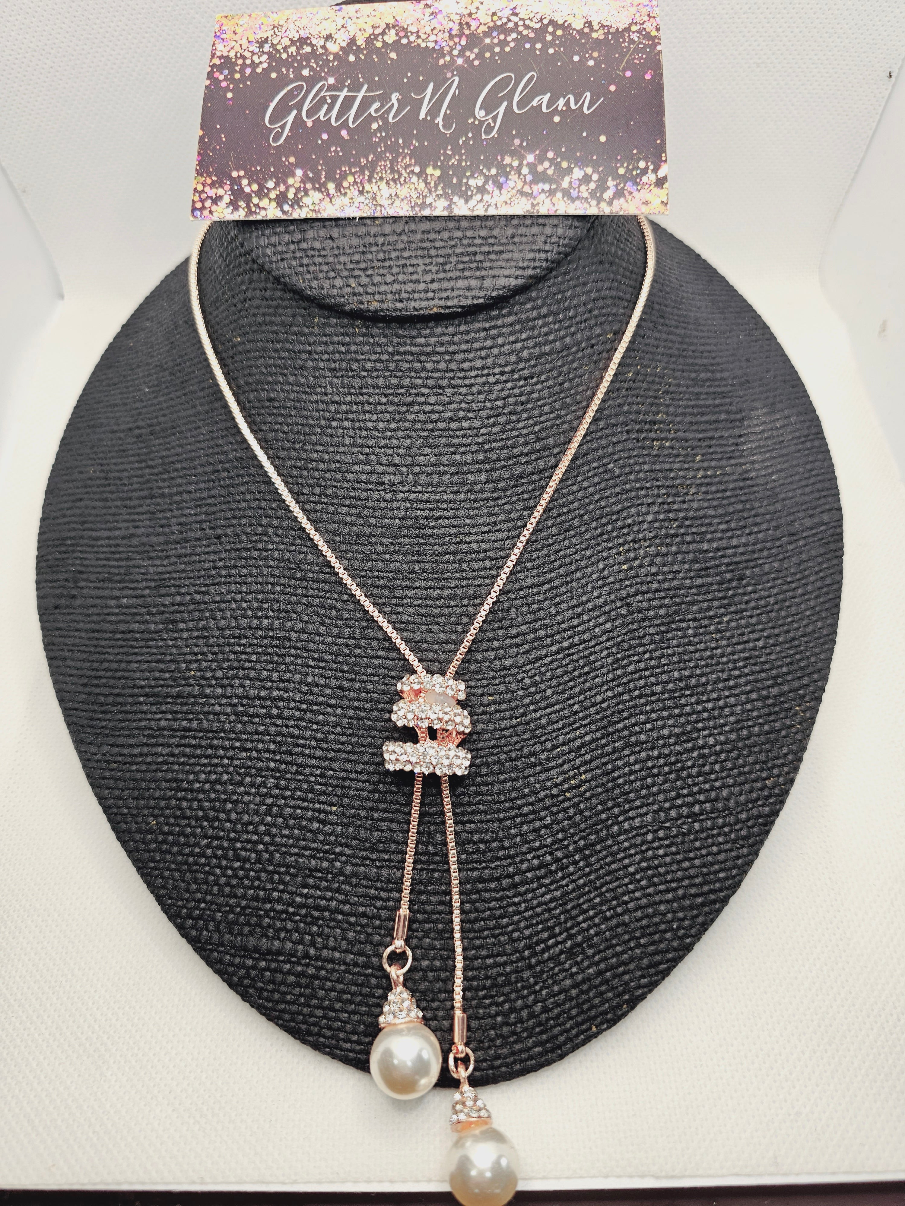 2011 Rosegold Long Sweater Necklace with Adjustable Bling and Pearls.