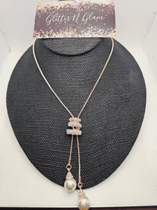 2011 Rosegold Long Sweater Necklace with Adjustable Bling and Pearls.