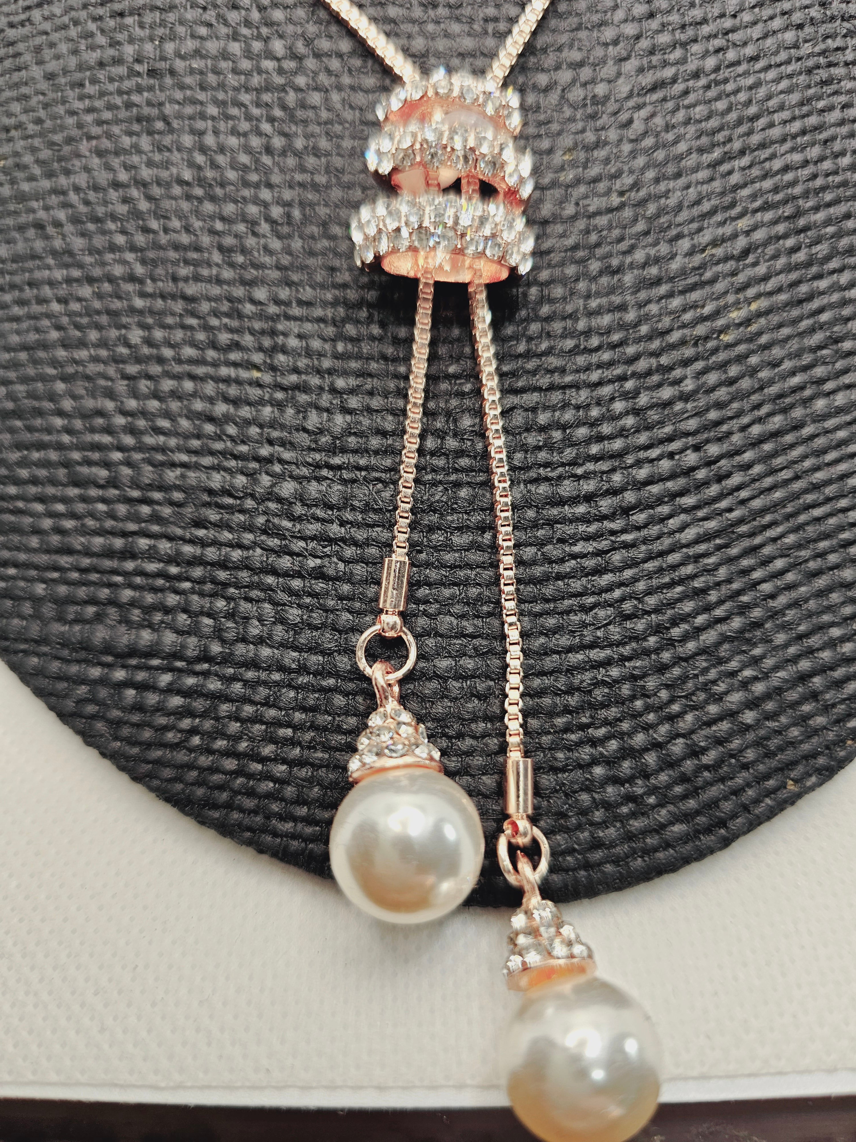 2011 Rosegold Long Sweater Necklace with Adjustable Bling and Pearls.