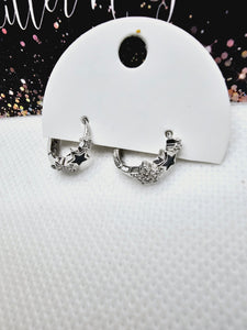 2398 Silver Star Huggie Hoops