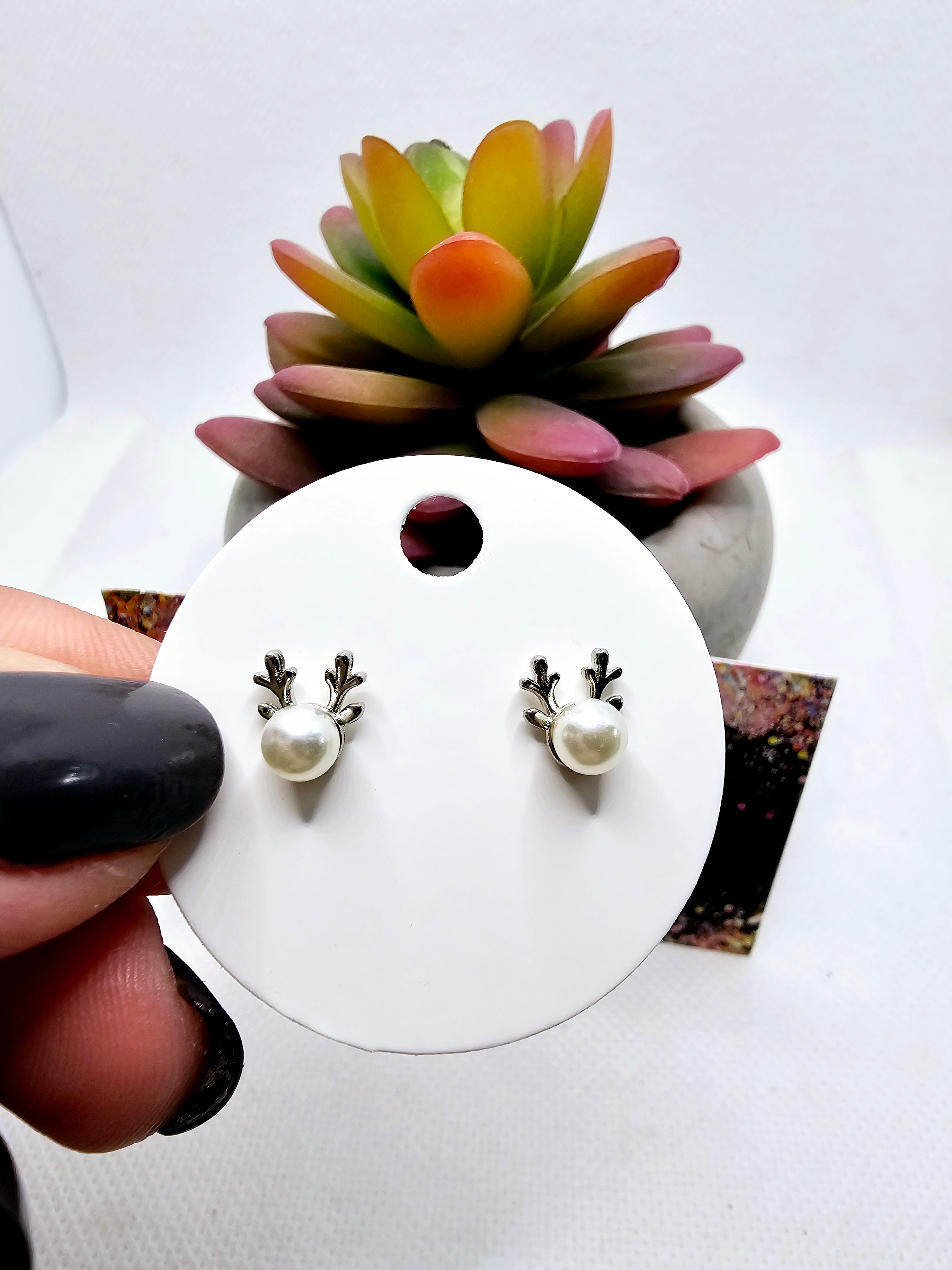2504 White Pearl Reindeer Stud Earrings