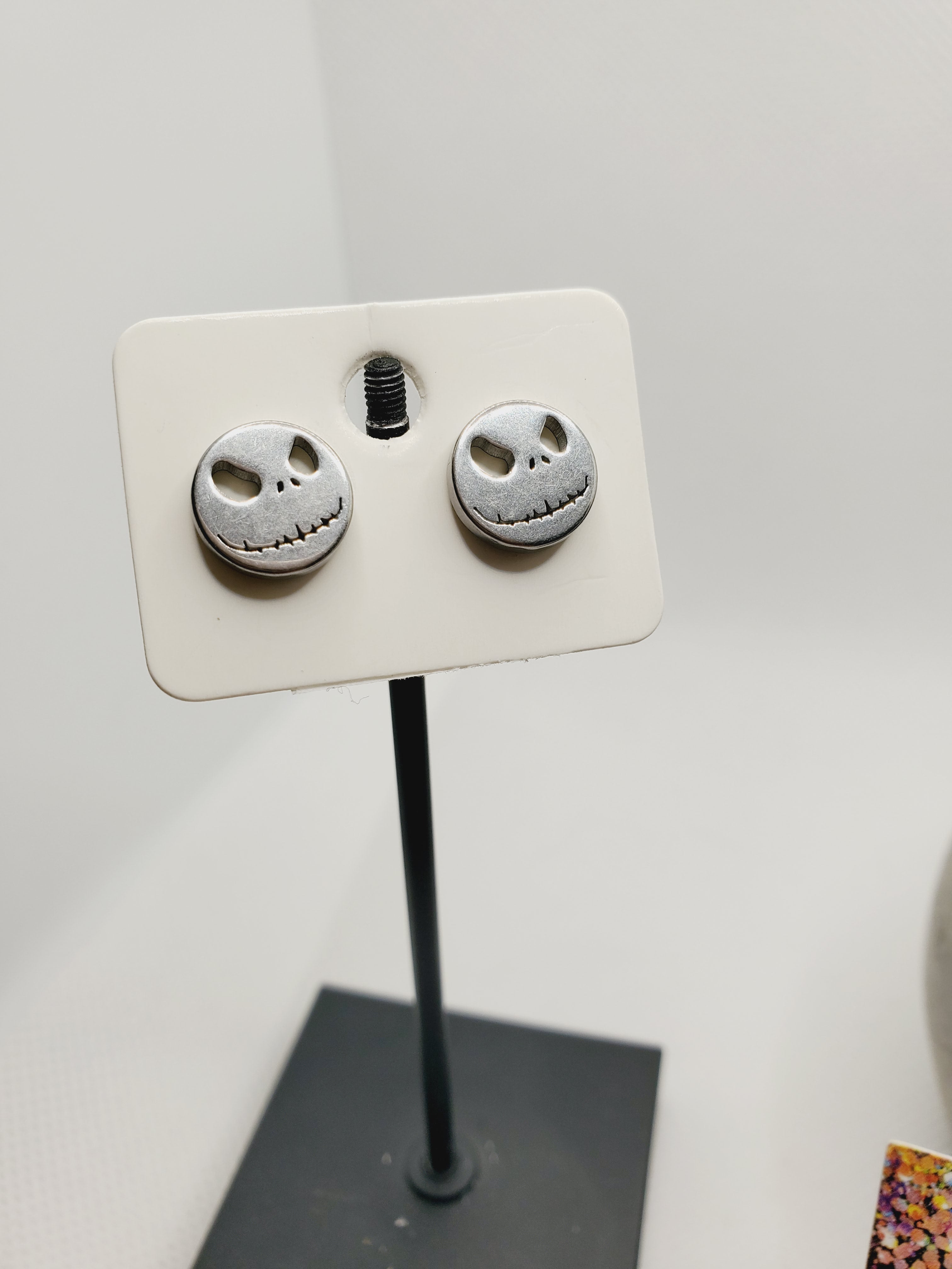 1013 Silver Metal NMBC Stud Earrings