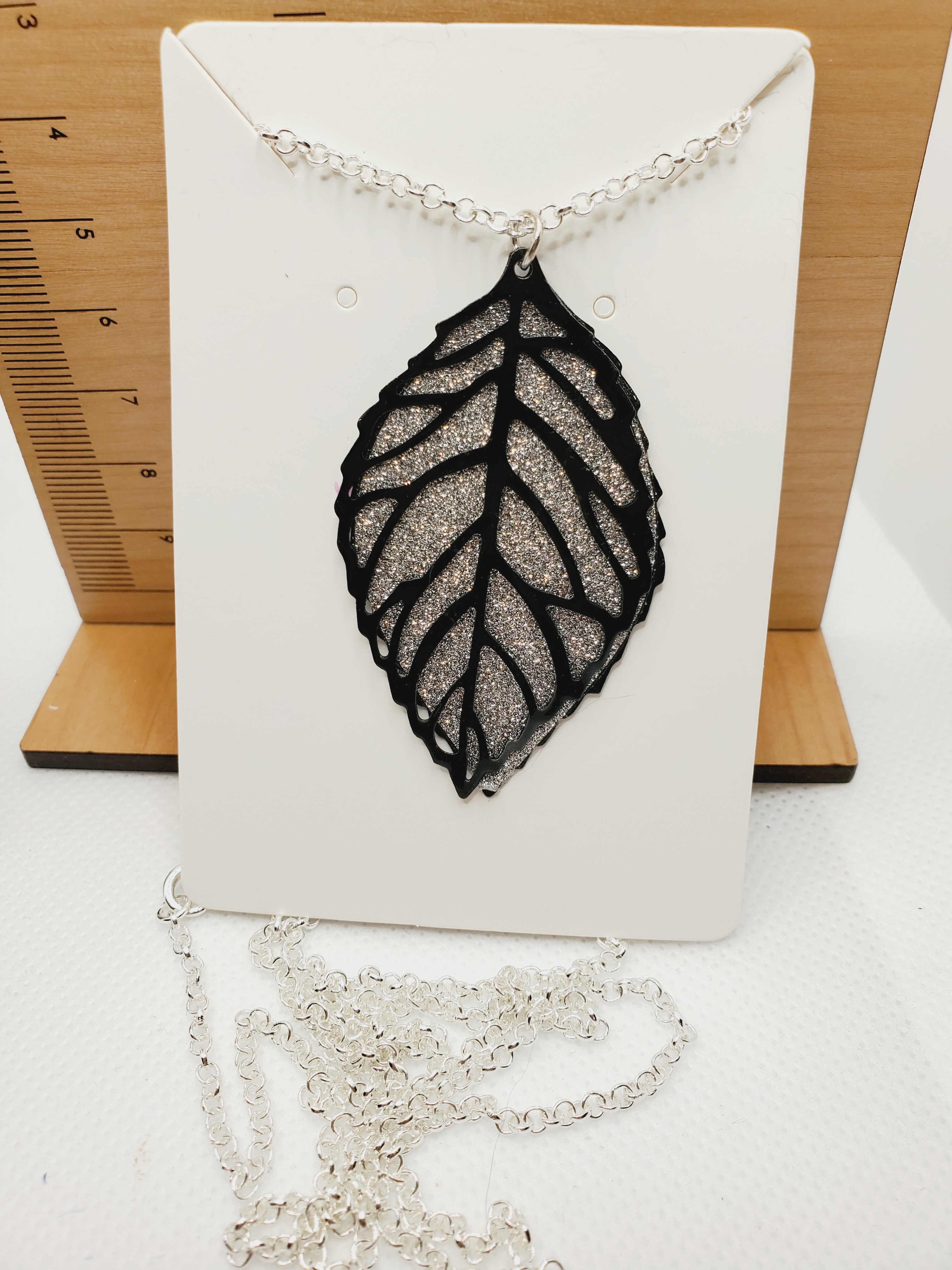 553 Black and Sparkly Silver Leaf Long Statement Necklace