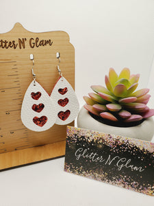 1149 Red and White Cut Out Heart Dangle Earrings