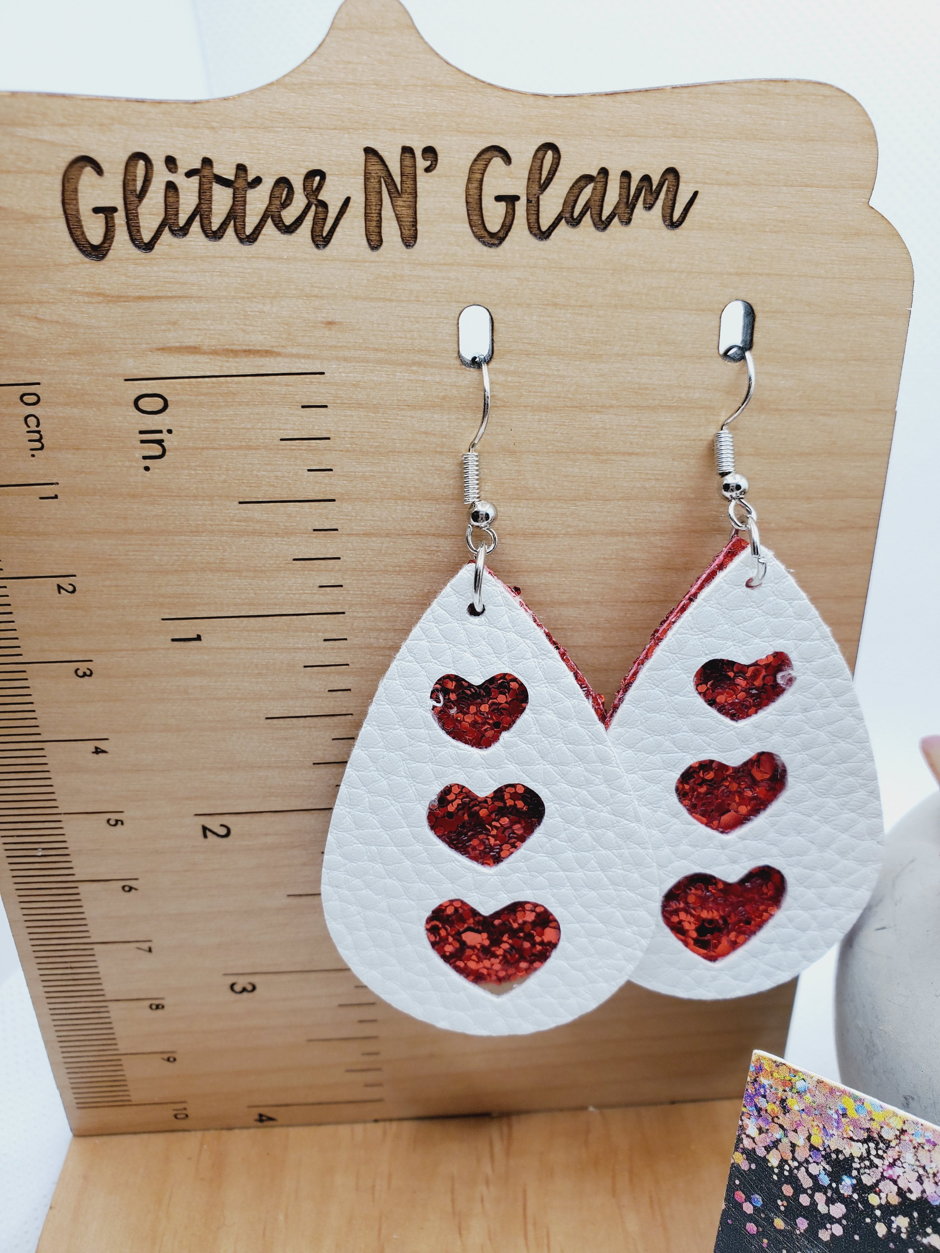 1149 Red and White Cut Out Heart Dangle Earrings