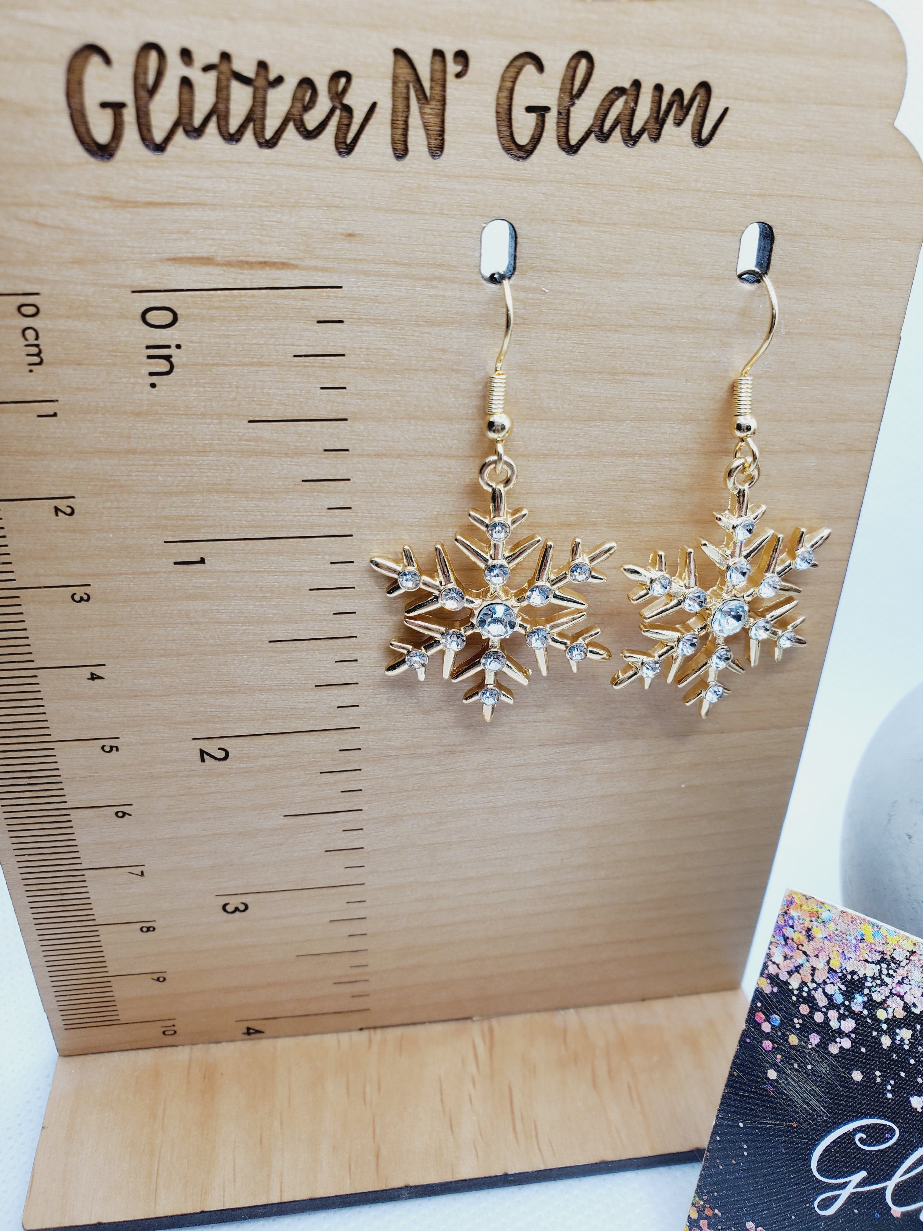 1551 Gold Sparkly Snowflake Dangle Earrings